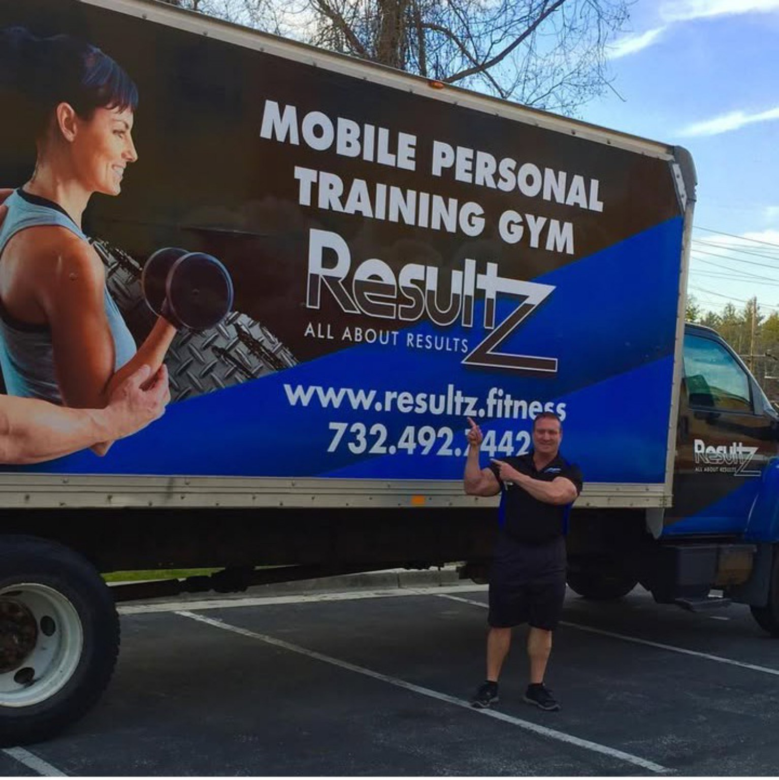 Resultz mobile personal training gym truck with branded Resultz logo